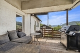 Überdachter Balkon